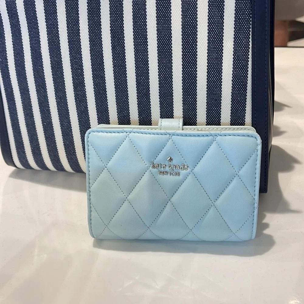 Kate Spade Carey Medium Compartment Bifold Wallet 
COLOR: Turquoise - Picture 14 of 16